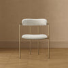 Serene Mid-Century Modern Metal Upholstered Dining Chair in Alabaster | Chaise de salle a manger moderne du milieu du siecle en metal et tissu, coloris albatre