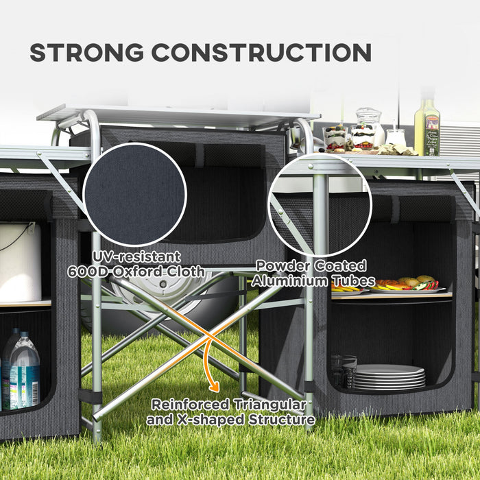 Outsunny Folding Camping Kitchen Table with Storage, Aluminum Portable Camping Table with 3 Fabric Cupboards, Windshield, Light Stand, Carrying Bag for BBQ, RV, Picnic, Black