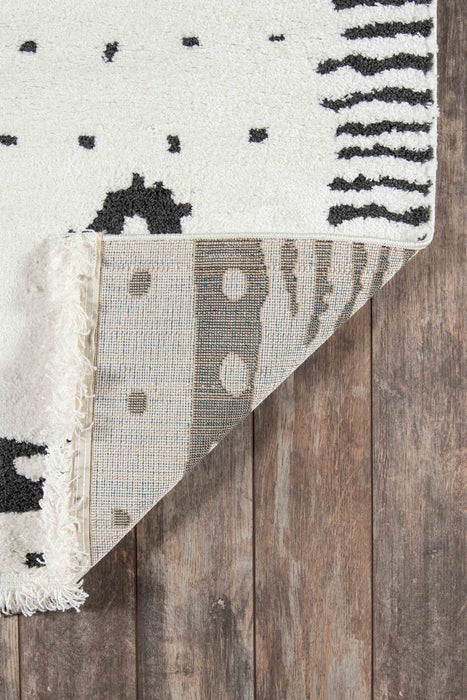 Lyra Contemporary 5'3\" x 7'2\" Area Rug in Ivory Indoor Area Rug