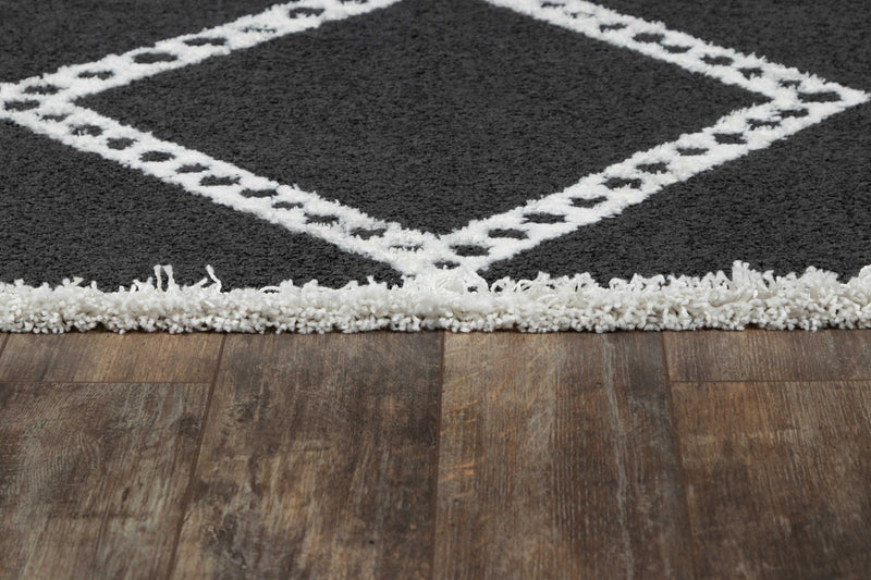 Zelda Contemporary 5'3\" x 7'2\" Area Rug in Black Indoor Area Rug