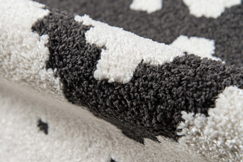 Lyra Contemporary 5'3\" x 7'2\" Area Rug in Ivory Indoor Area Rug