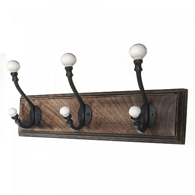 Triple Iron Hooks with Ceramic Knobs on Wood Base|Trois crochets en fer avec boutons en céramique sur une base en bois