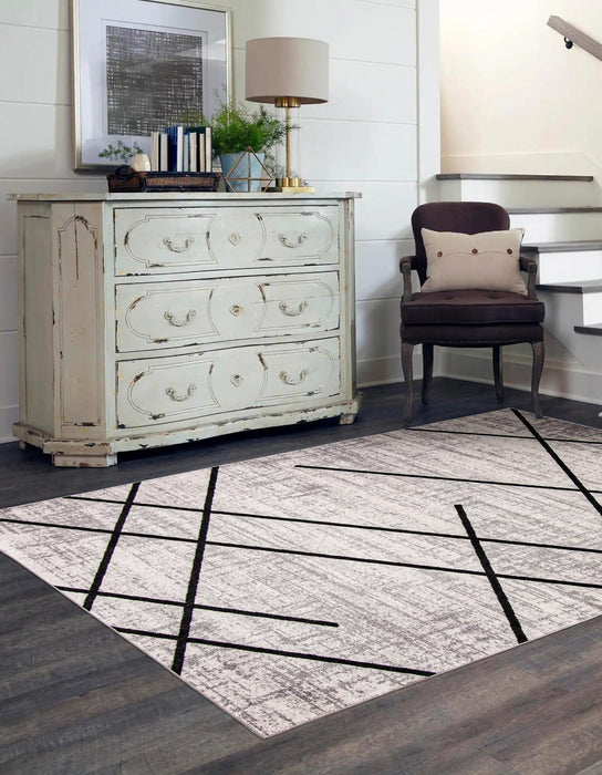 Damali Ivory/Black Machine Washable Area Rug - 5'0\" x 7'0\"