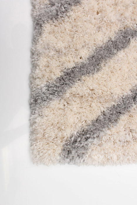 Miah Cream Area Rug - 6'7\" x 9'6\"