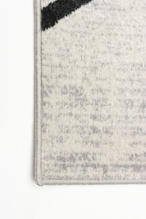 Damali Ivory/Black Machine Washable Area Rug - 5'0\" x 7'0\"