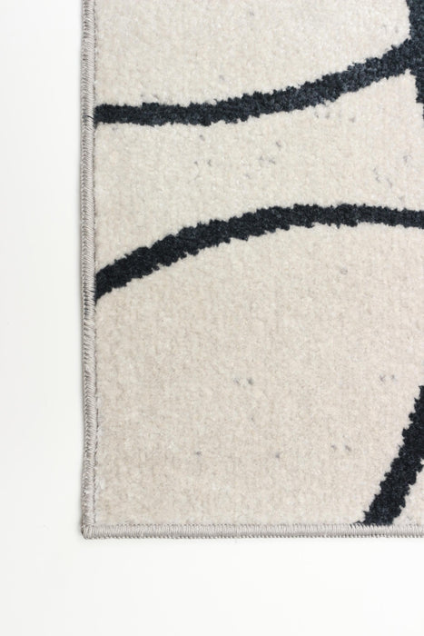 Terali Ivory Machine Washable Area Rug - 5'0\" x 7'0\"