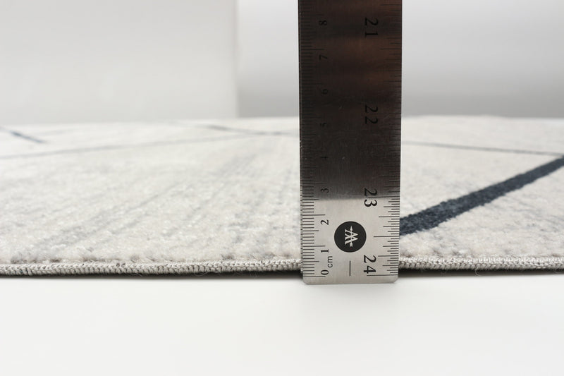 Damali Ivory/Blue Machine Washable Area Rug - 5'0\" x 7'0\"