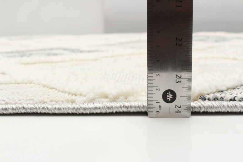 Alaqua Ivory Area Rug - 5'0\" x 7'0\"