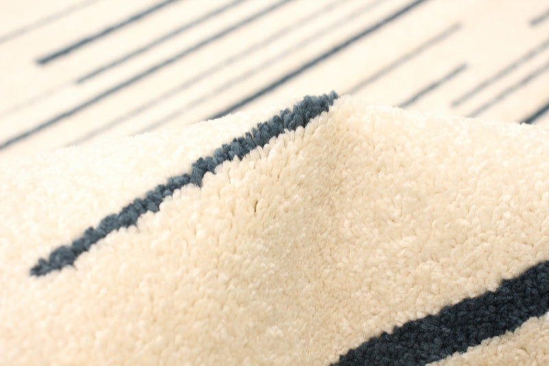 Faith Cream-Prol Area Rug - 3'11\" x 5'7\"