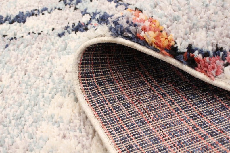 Makondo Abstract Ivory Area Rug - 3'11\" x 5'11\"